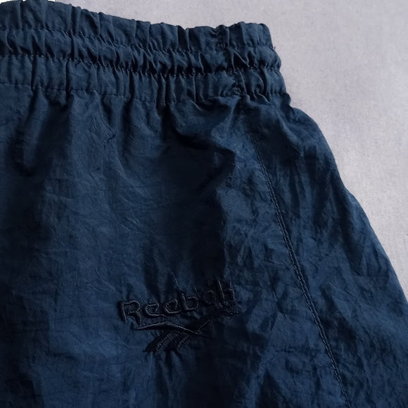 Vintage 90s Reebok Essential Slash Pants Unisex
