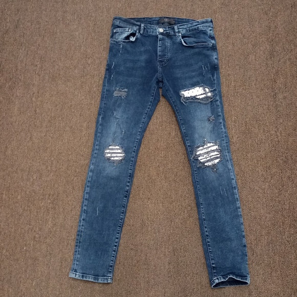 Amiri distressed denim jeans