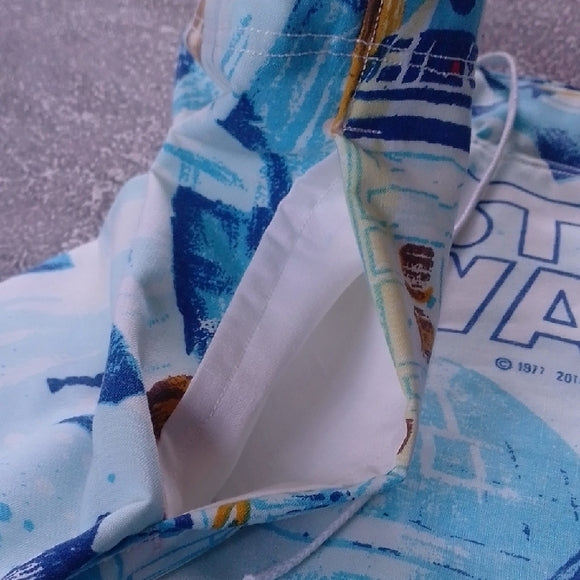 “1977 Star Wars Patchwork Shorts – Featuring Darth Vader, Leia, and More | Boom