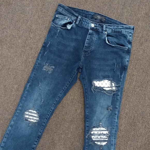 Amiri distressed denim jeans