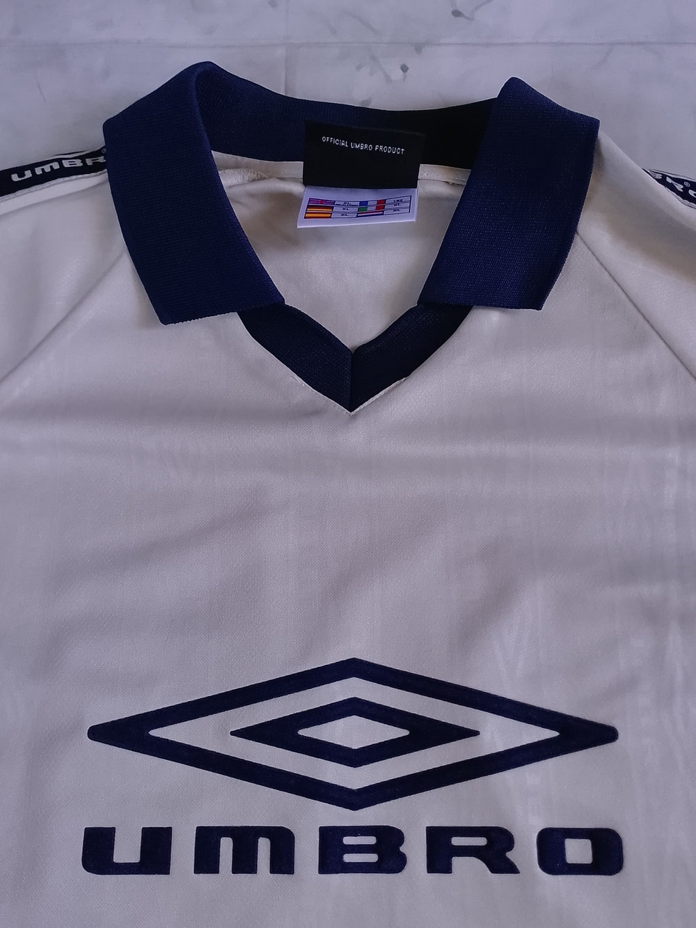 Umbro Men’s Cream/Navy Soccer Jersey