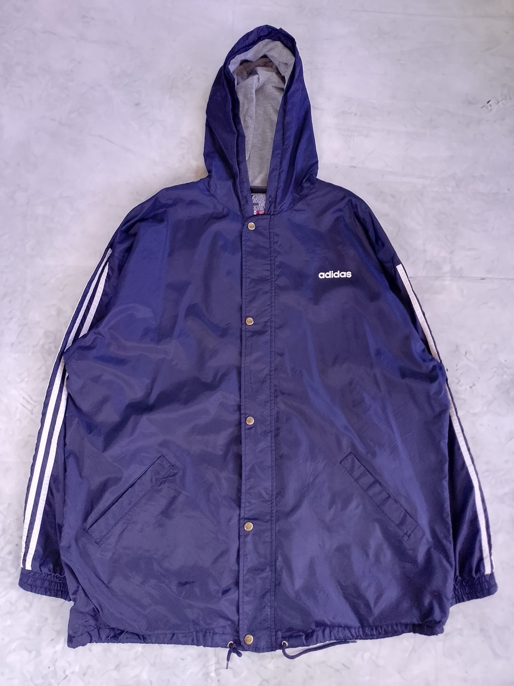 Vintage 90s adidas Navy Hooded Windbreaker with the Classic White Stripe Accents