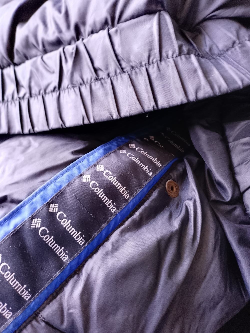 Vintage Columbia Down Black Puffer Jacket with Blue Shoulder Accents