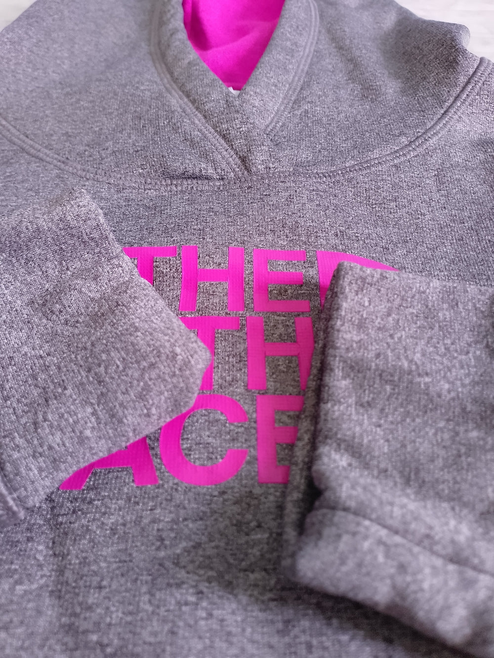 The North Face Hoodie with Pink Logo