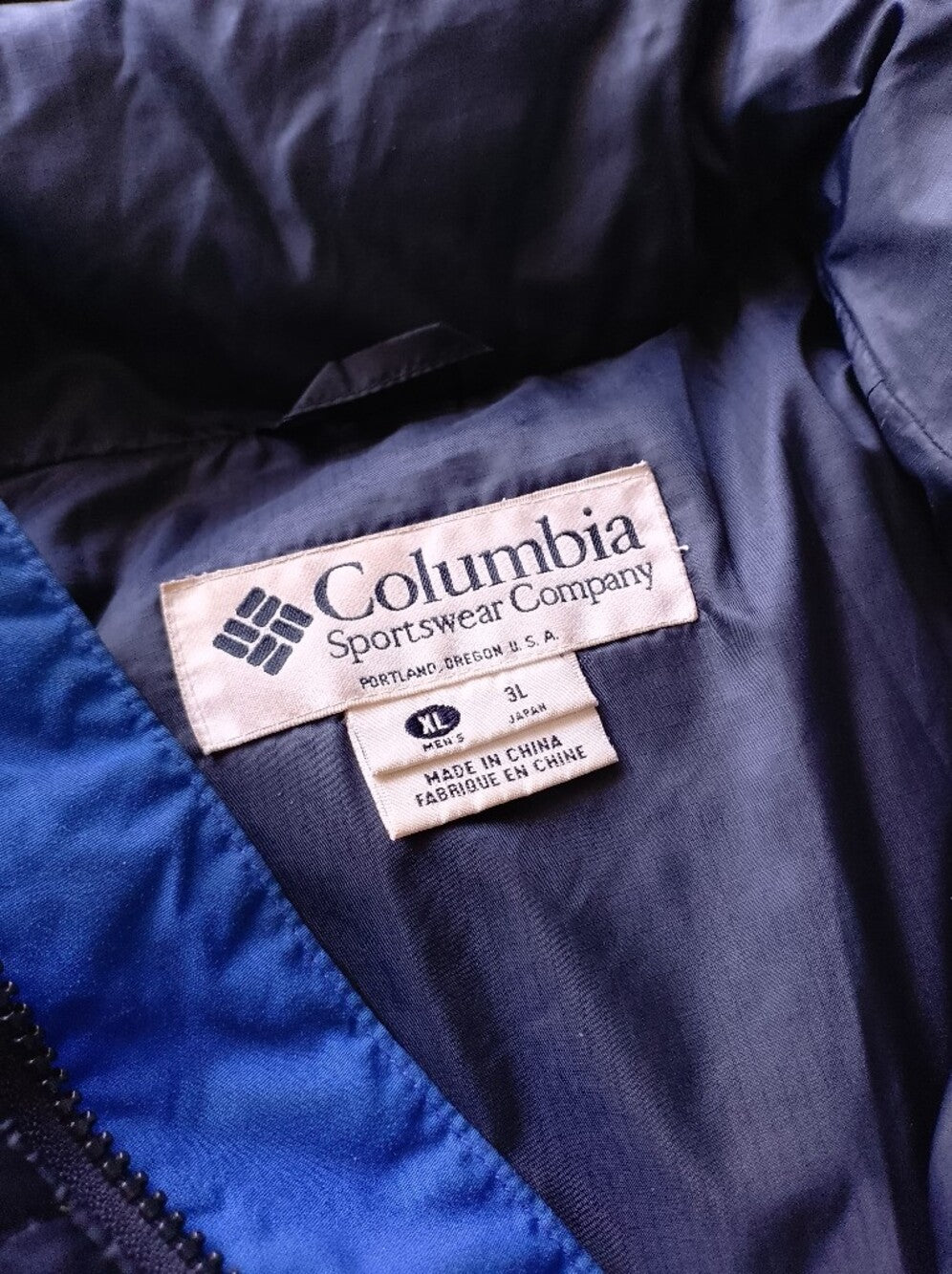 Vintage Columbia Down Black Puffer Jacket with Blue Shoulder Accents