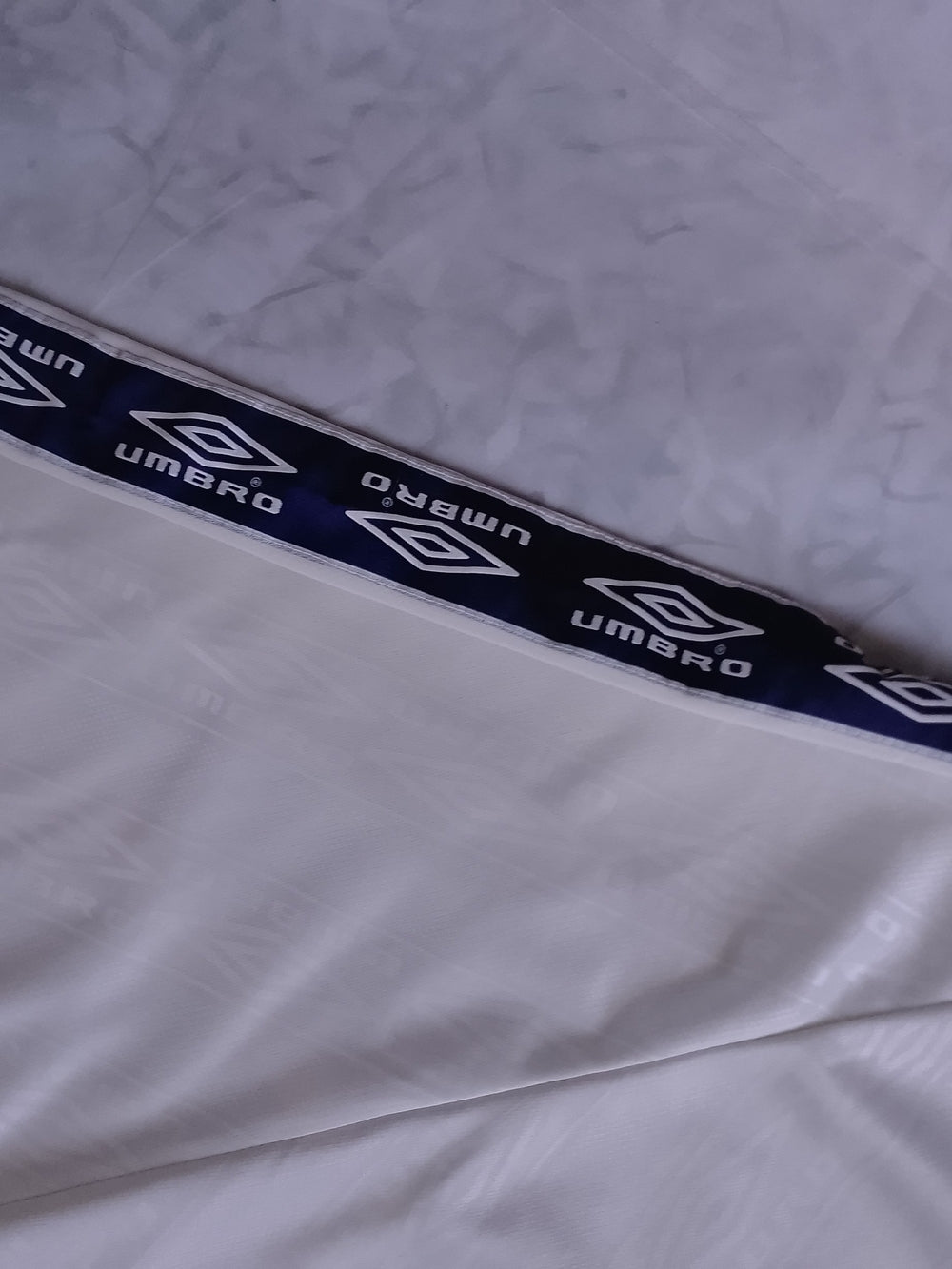 Umbro Men’s Cream/Navy Soccer Jersey