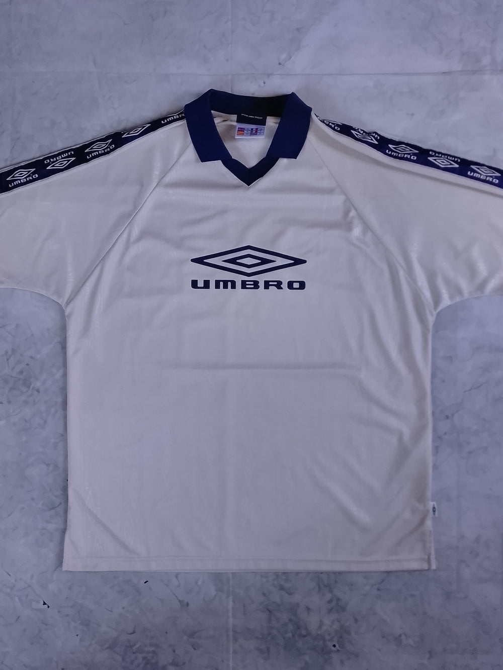 Umbro Men’s Cream/Navy Soccer Jersey