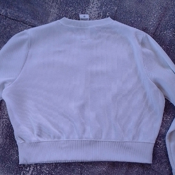 Nike THE PLAYERS Women's White Textured Cropped Sweatshirt