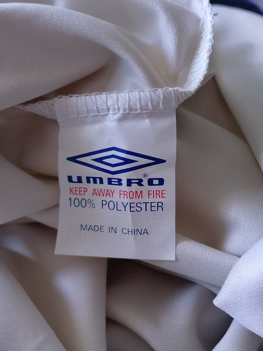 Umbro Men’s Cream/Navy Soccer Jersey