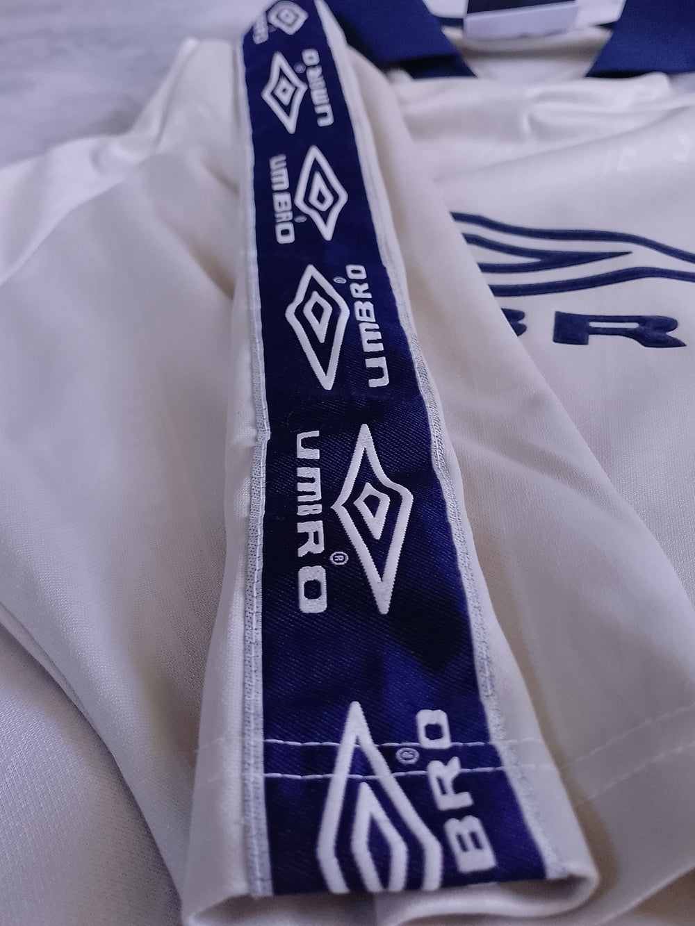 Umbro Men’s Cream/Navy Soccer Jersey