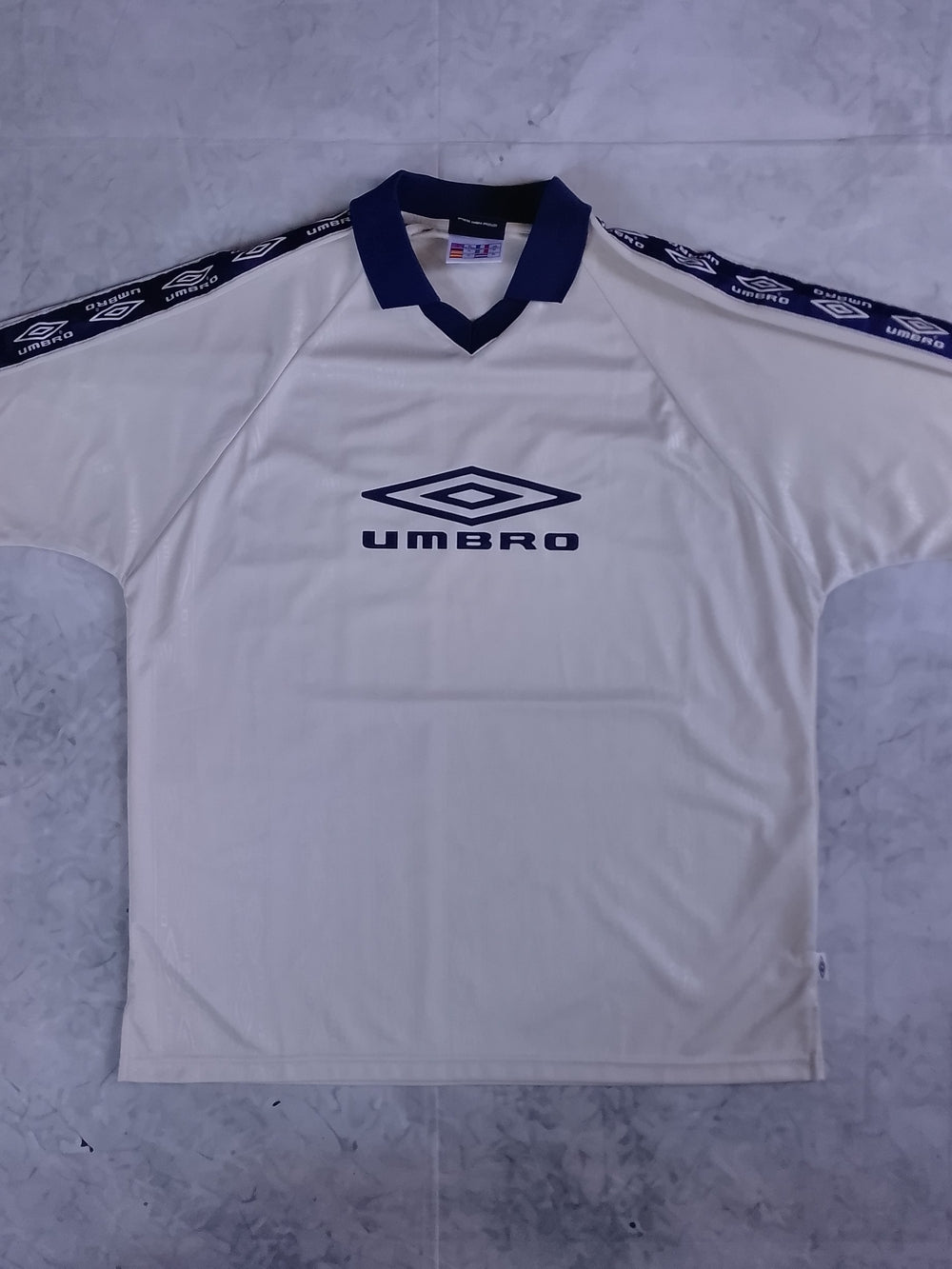 Umbro Men’s Cream/Navy Soccer Jersey