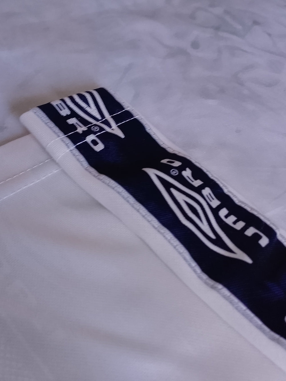 Umbro Men’s Cream/Navy Soccer Jersey