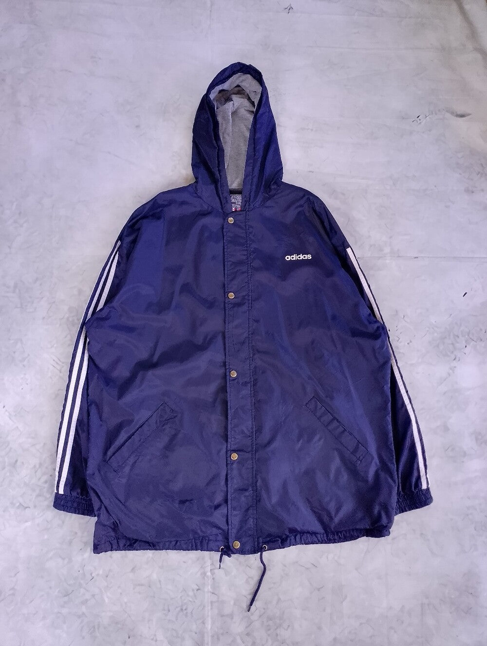 Vintage 90s adidas Navy Hooded Windbreaker with the Classic White Stripe Accents