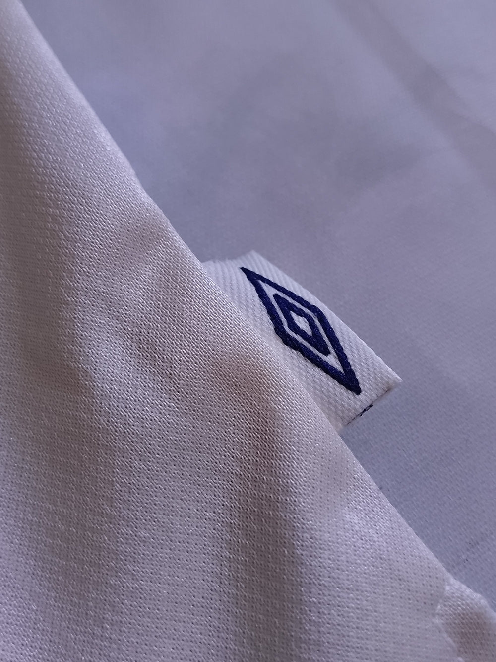 Umbro Men’s Cream/Navy Soccer Jersey