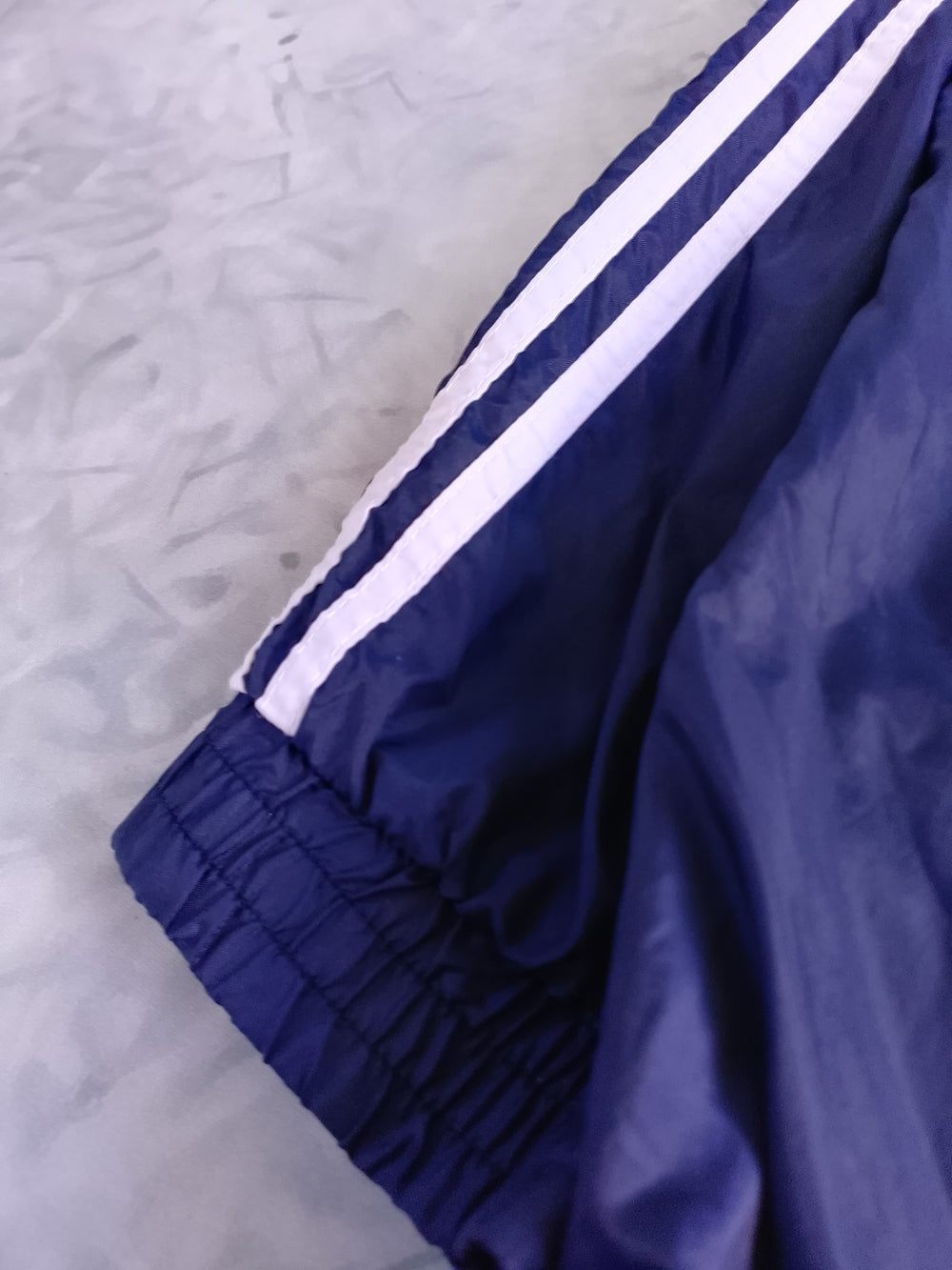 Vintage 90s adidas Navy Hooded Windbreaker with the Classic White Stripe Accents