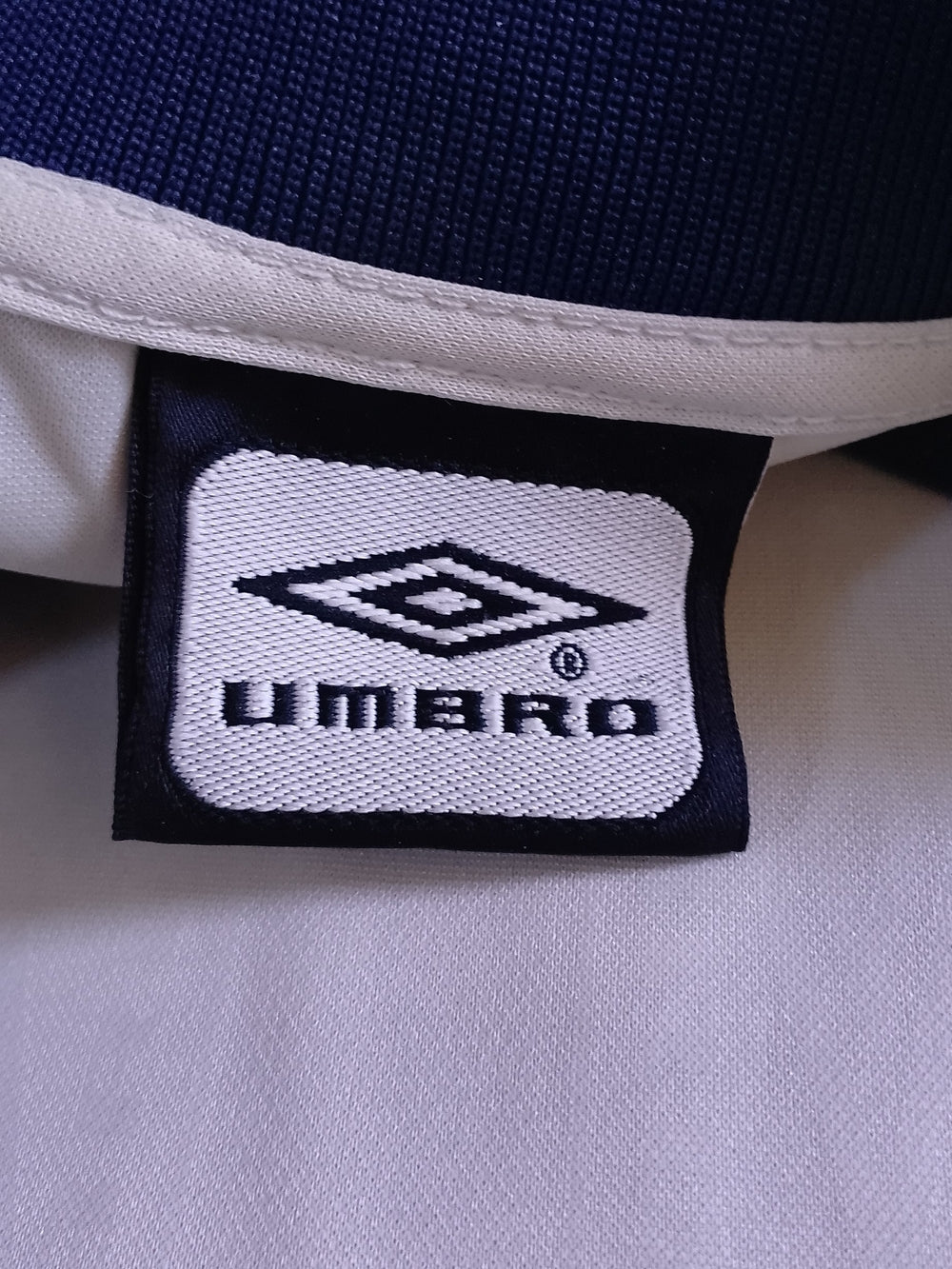 Umbro Men’s Cream/Navy Soccer Jersey